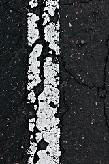 Image showing Asphalt road line closeup. 