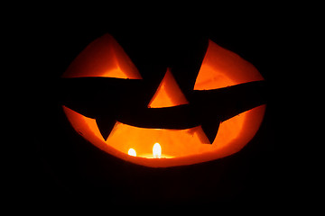 Image showing Spooky halloween pumpkins (jack-o-lantern). Closeup shot.