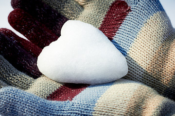 Image showing Snow heart in woman hands