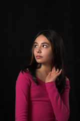 Image showing teen posing over black backdrop