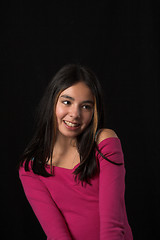 Image showing teen posing over black backdrop