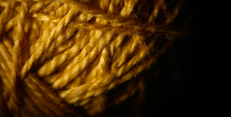 Image showing Macro shot of a ball of string texture isolated on black