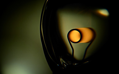 Image showing Glower is heated. Conceptual shot of incandescent lamp in green.