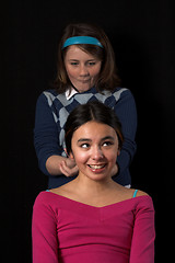 Image showing teen posing over black backdrop