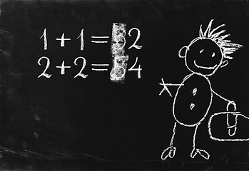 Image showing Simple math operation writing chalk on blackboard.