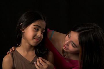 Image showing teen posing over black backdrop