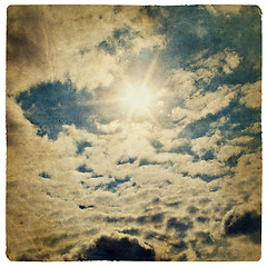 Image showing Sun on blue sky, vintage background.