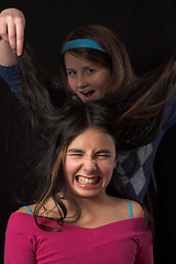 Image showing teen posing over black backdrop