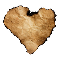 Image showing Burned heart-shaped paper isolated on white.