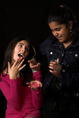 Image showing teen posing over black backdrop