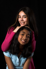 Image showing teen posing over black backdrop