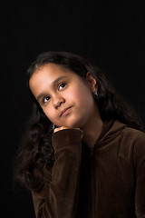 Image showing teen posing over black backdrop