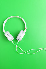 Image showing Headphone on green background