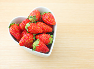 Image showing Strawberry in heart shape bowl