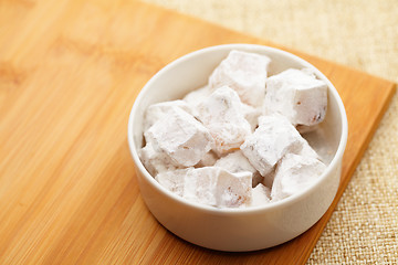 Image showing Turkish candy on wooden board