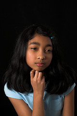 Image showing teen posing over black backdrop