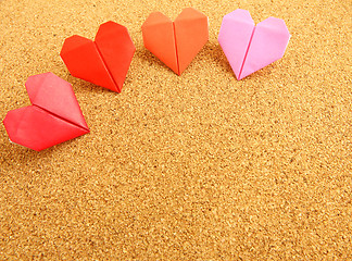 Image showing Origami colorful heart on corkboard