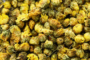 Image showing Dried chamomile tea isolated on white background