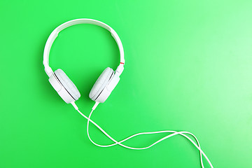 Image showing Headphone on green background