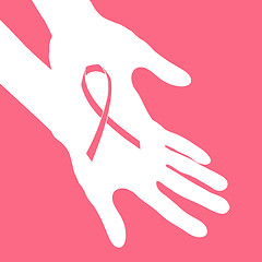 Image showing Breast cancer ribbon in hands.