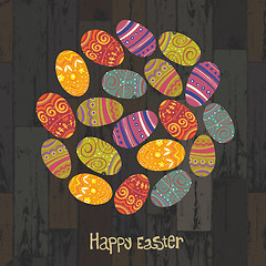 Image showing Easter eggs. Circle shaped on wooden planks background. Vector, 