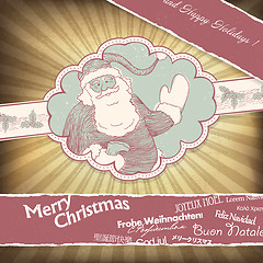 Image showing Retro Santa Claus greetings in different languages. Christmas ba