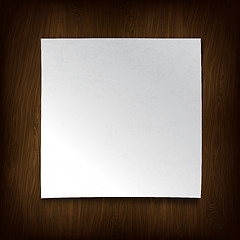Image showing White paper on a wooden wall. Vector illustration.