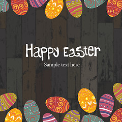 Image showing Easter eggs on wooden planks background. Vector, EPS10