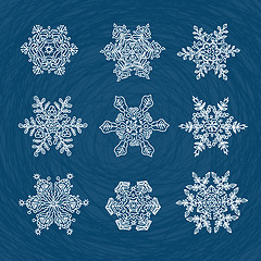 Image showing Macro-structure of real snowflakes, transformed and drawn as orn