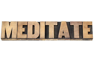 Image showing meditate word in wood type