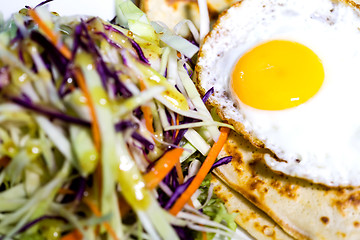 Image showing Fried egg and coleslaw, rich breakfast