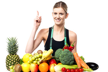 Image showing Pretty slim girl with fruits and vegetables