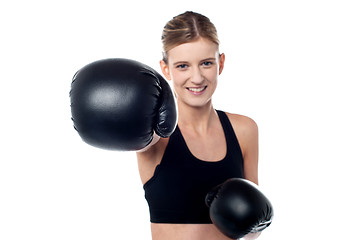 Image showing Fitness woman wearing boxing gloves