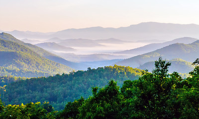 Image showing early morning sunrise over blue ridge mountains