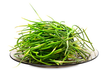 Image showing Fresh garlic scapes on plate