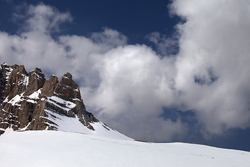 Image showing Rock and snow pass in clouds