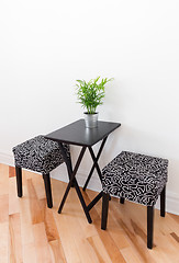 Image showing Black table with two chairs