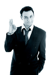 Image showing monochrome picture of friendly businessman showing ok sign