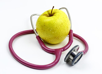 Image showing stethoscope and an apple