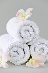 Image showing White rolled up spa towels