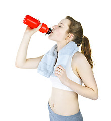 Image showing Fit girl drinking water