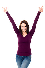 Image showing Victorious young woman celebrating her success