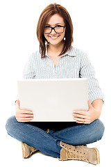 Image showing Casual woman working on a laptop