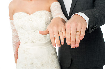 Image showing Bride and groom showing their wedding rings