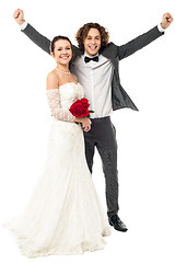 Image showing Joyous newlywed couple, excited guy