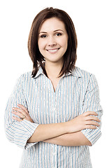 Image showing Young smiling female posing confidently