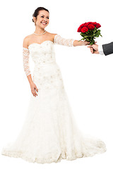 Image showing Groom presenting beautiful bride love roses