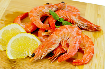 Image showing Shrimp on a wooden board