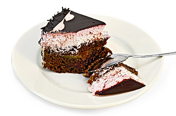 Image showing Cake chocolate with pink cream and spoon