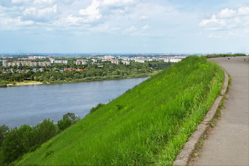 Image showing View of the city from a high bank of the river
